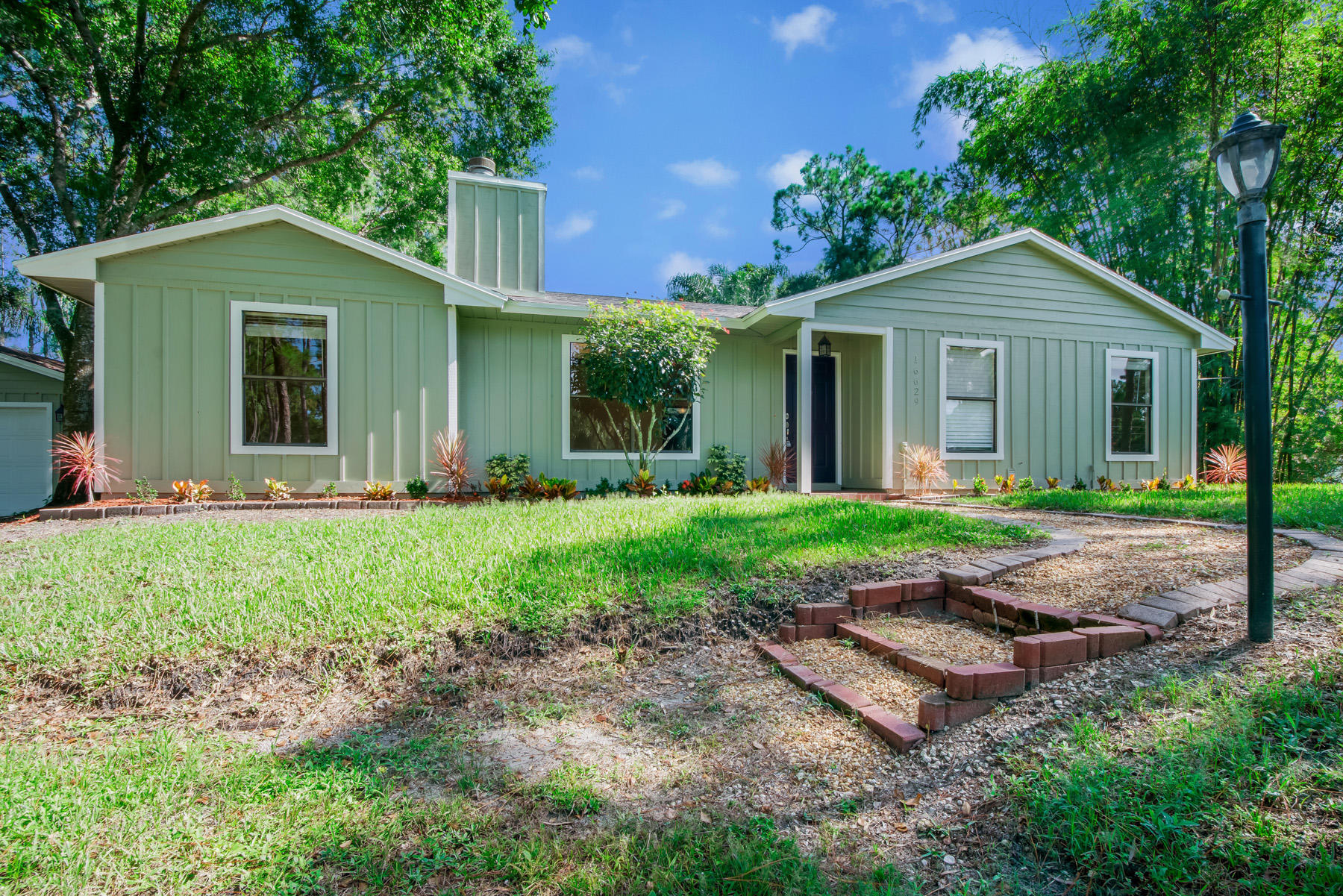 16629 93rd Road North Loxahatchee, FL 33470 - Photo 3 of 38 1 Exterior Front 3 LR1_5492-Edit