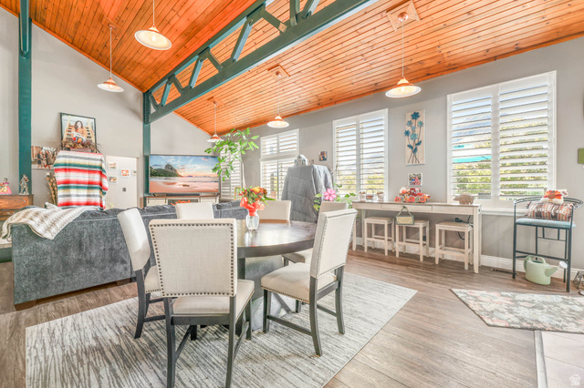 569 Elk Meadow Loop Tooele, UT 84074 - Photo 16 of 56 Dining space with wood finished floors, a vaulted wood ceiling, and plenty of natural light