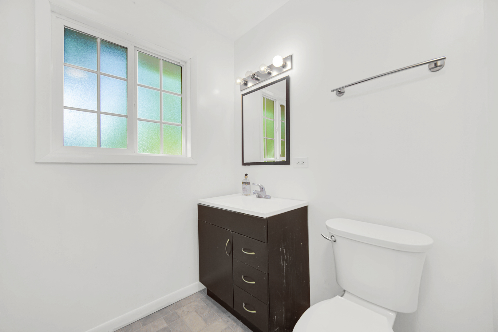 120 Indiana Street Park Forest, IL 60466 - Photo 11 of 25 a bathroom with a toilet sink and mirror