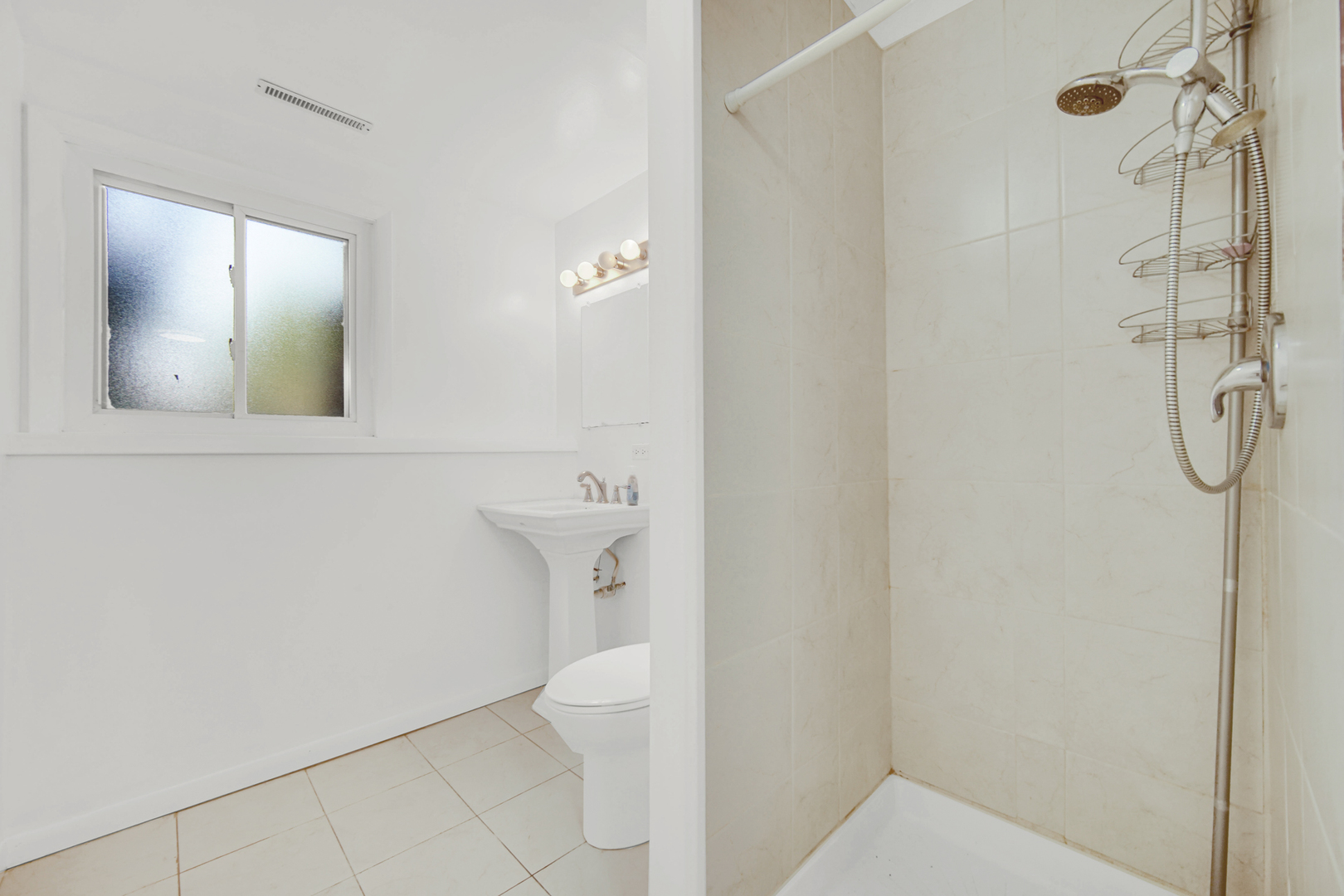 120 Indiana Street Park Forest, IL 60466 - Photo 20 of 25 a bathroom with a granite countertop shower and a toilet