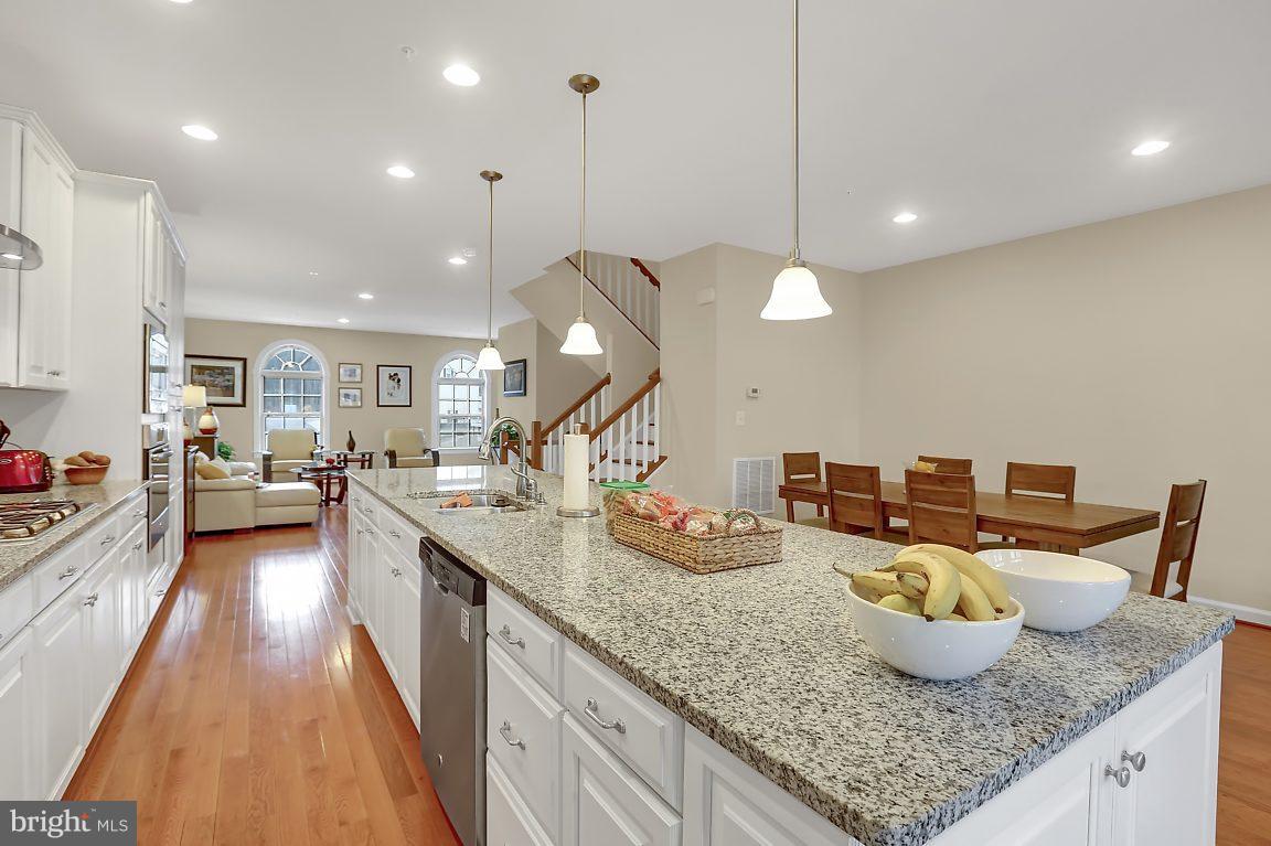 7872 Patterson Way Hanover, MD 21076 - Photo 13 of 26 a kitchen with counter top space and a sink