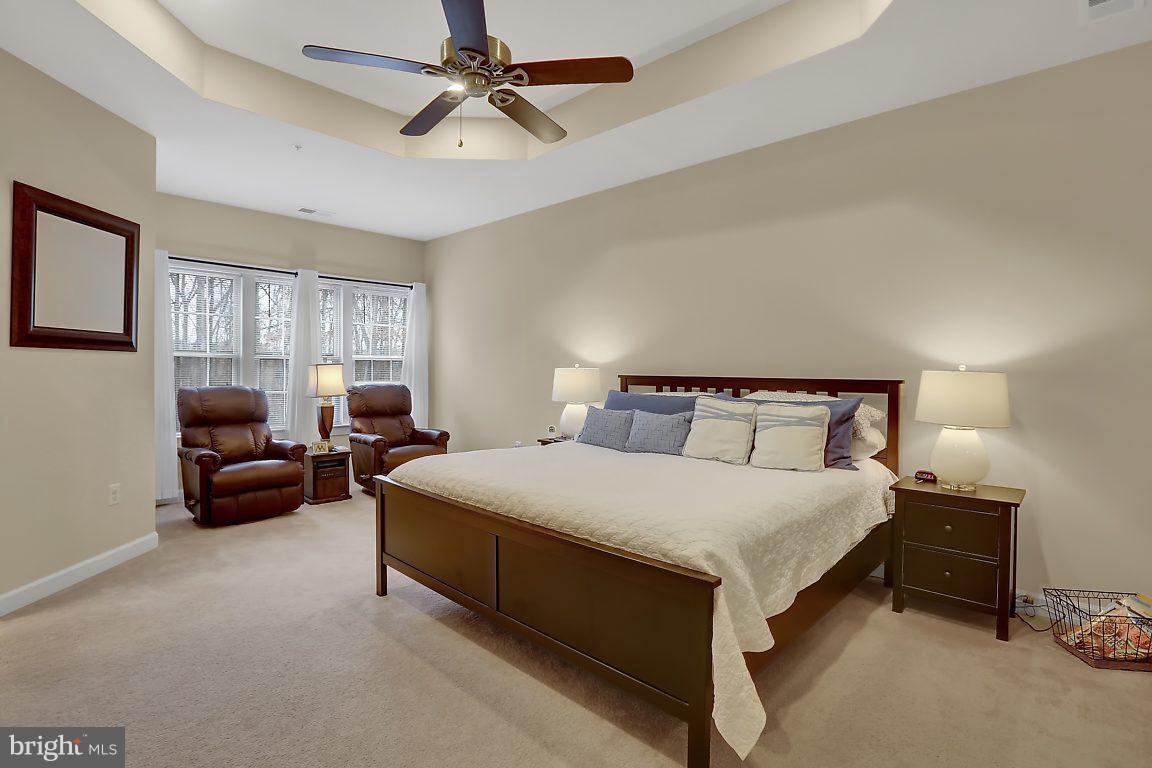 7872 Patterson Way Hanover, MD 21076 - Photo 16 of 26 a spacious bedroom with a bed and window