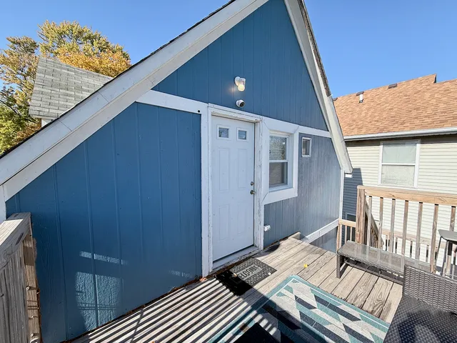 a view of balcony and wooden floor