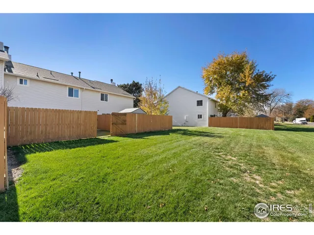 a view of a backyard with a garden