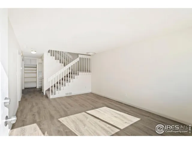 a view of an entryway with stairs