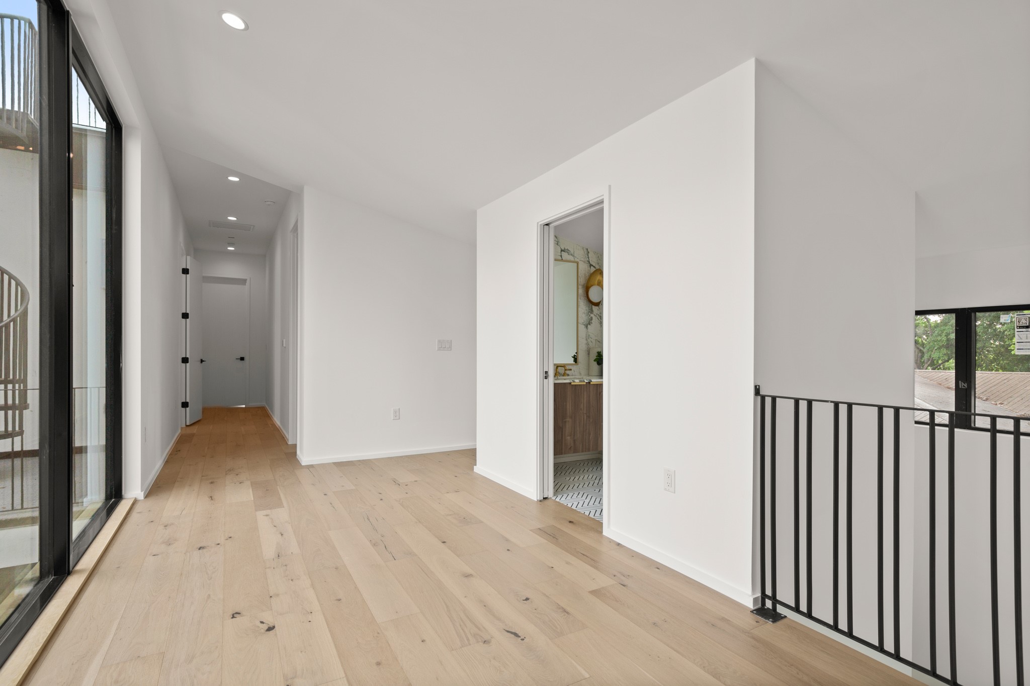 1805 Collier Street Austin, TX 78704 - Photo 23 of 40 a view of hallway with wooden floor