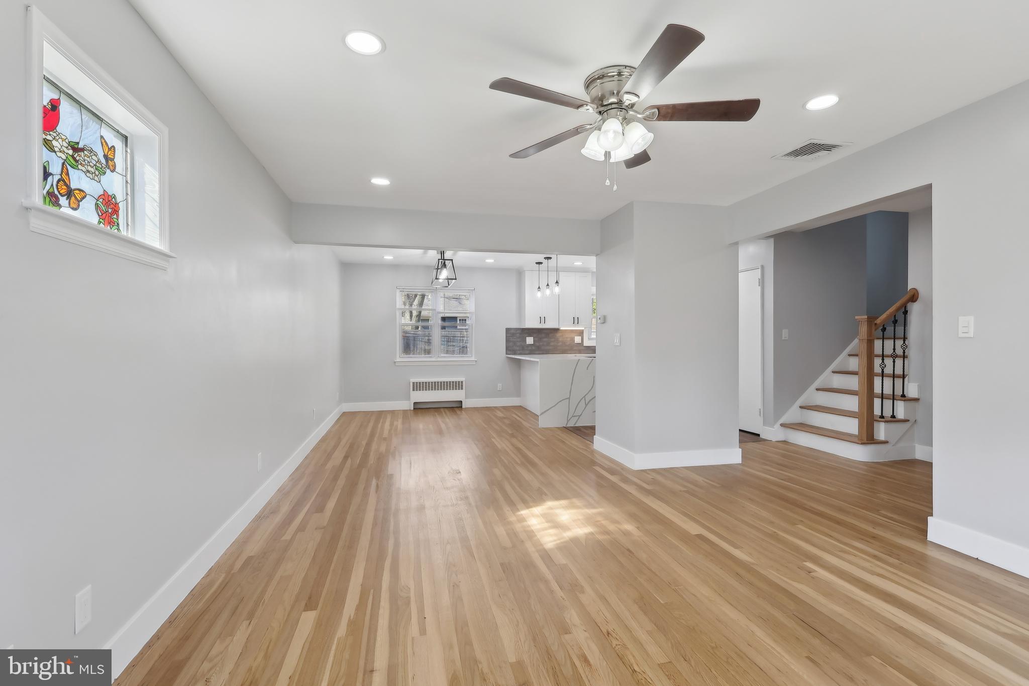 904 Big Oak Road Yardley, PA 19067 - Photo 13 of 56 a view of a livingroom with wooden floor