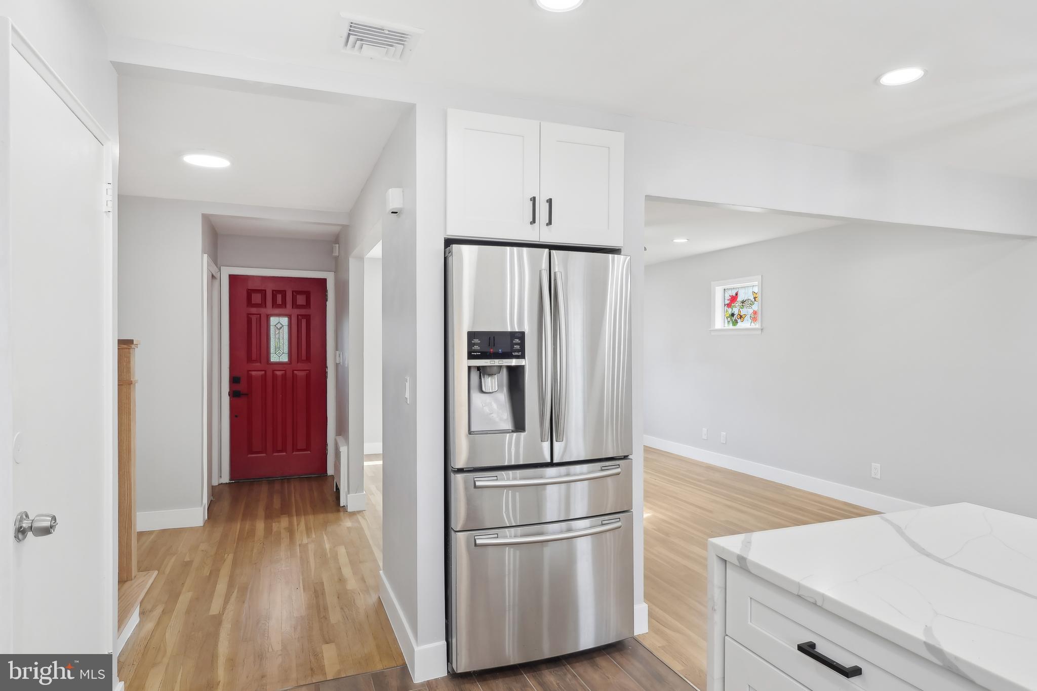 904 Big Oak Road Yardley, PA 19067 - Photo 20 of 56 a kitchen with cabinets and stainless steel appliances