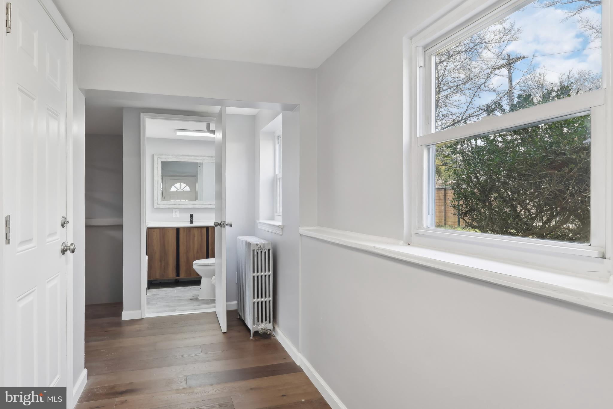 904 Big Oak Road Yardley, PA 19067 - Photo 24 of 56 a view of a bathroom from a hallway
