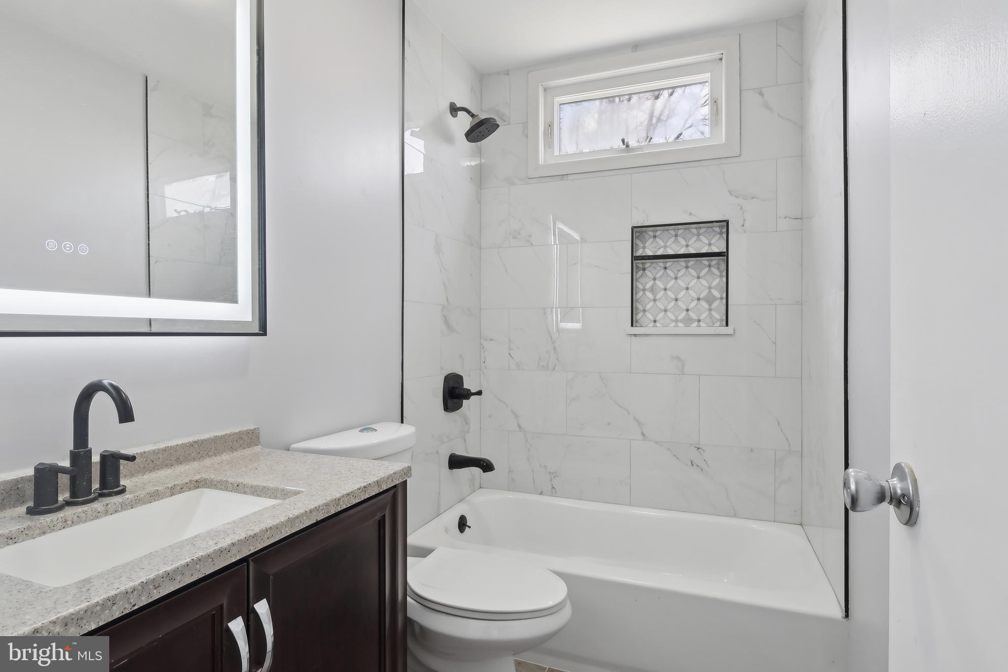 904 Big Oak Road Yardley, PA 19067 - Photo 26 of 56 a bathroom with a sink toilet and shower