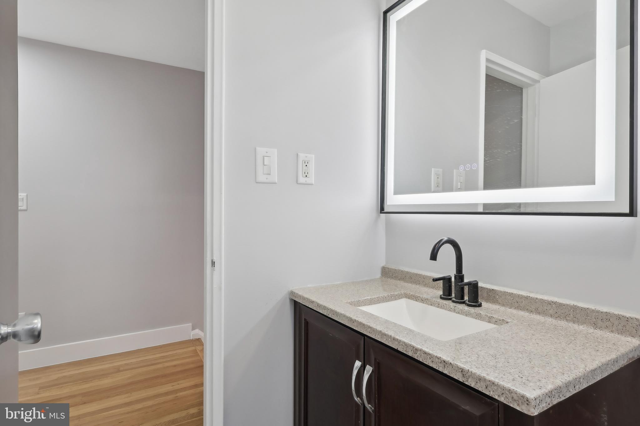 904 Big Oak Road Yardley, PA 19067 - Photo 27 of 56 a bathroom with a sink and a mirror