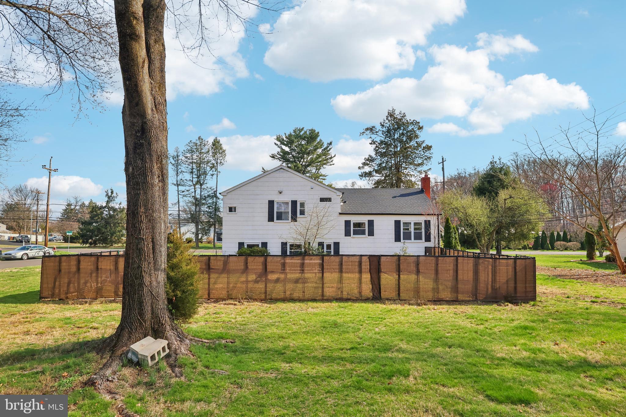 904 Big Oak Road Yardley, PA 19067 - Photo 35 of 56 a view of a house with backyard and a tree