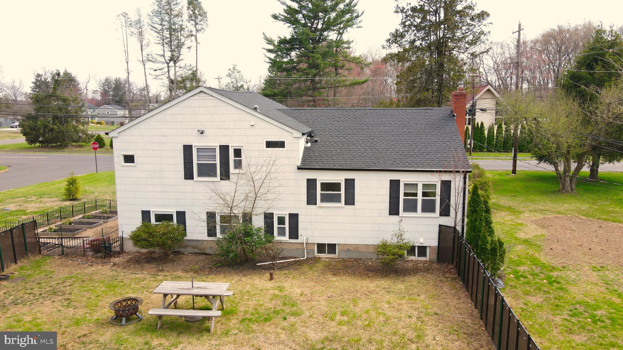 904 Big Oak Road Yardley, PA 19067 - Photo 51 of 56 a view of a house with backyard patio and swimming pool