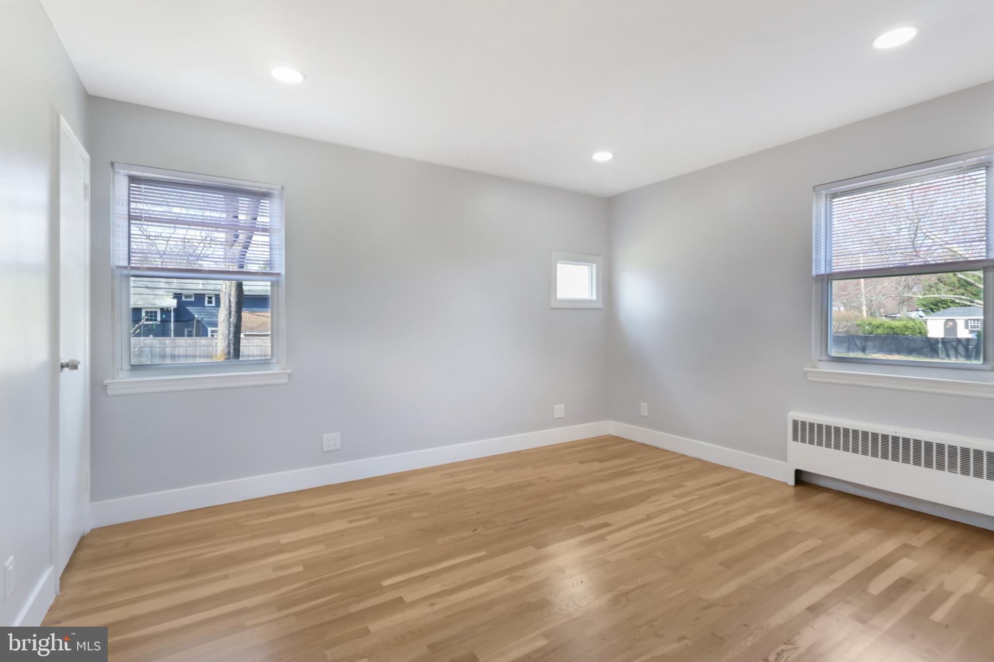 904 Big Oak Road Yardley, PA 19067 - Photo 8 of 56 a view of an empty room with a window