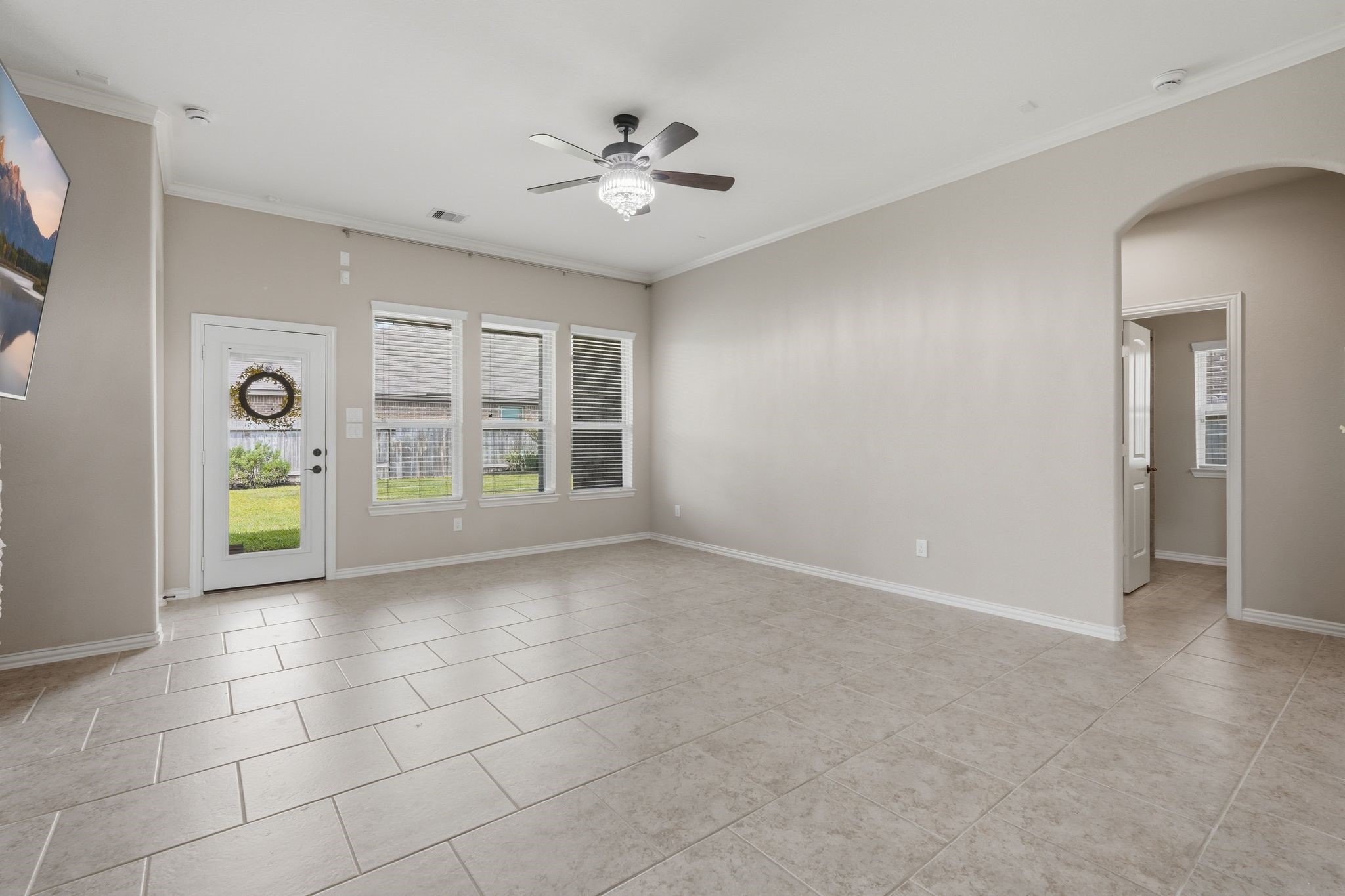18227 Tacoma Ridge Drive Tomball, TX 77377 - Photo 15 of 45 Spacious living room filled with natural light and designed for easy gathering and relaxation.