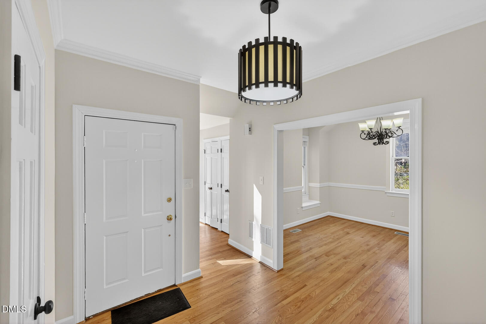 1707 Falls Church Road Raleigh, NC 27609 - Photo 27 of 64 a view of empty room with wooden floor and window