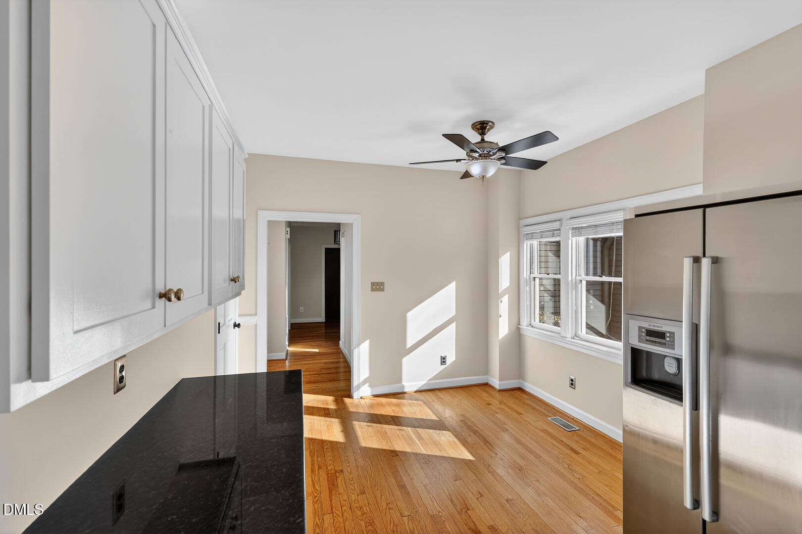 1707 Falls Church Road Raleigh, NC 27609 - Photo 33 of 64 a view of a kitchen with a sink and refrigerator