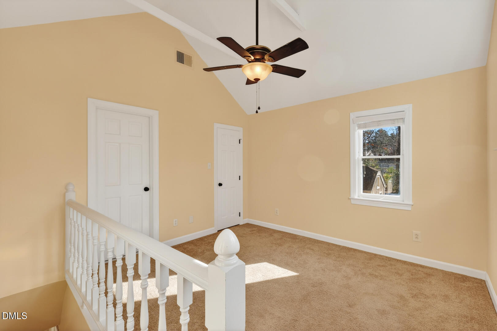 1707 Falls Church Road Raleigh, NC 27609 - Photo 36 of 64 a view of a livingroom with a ceiling fan and window