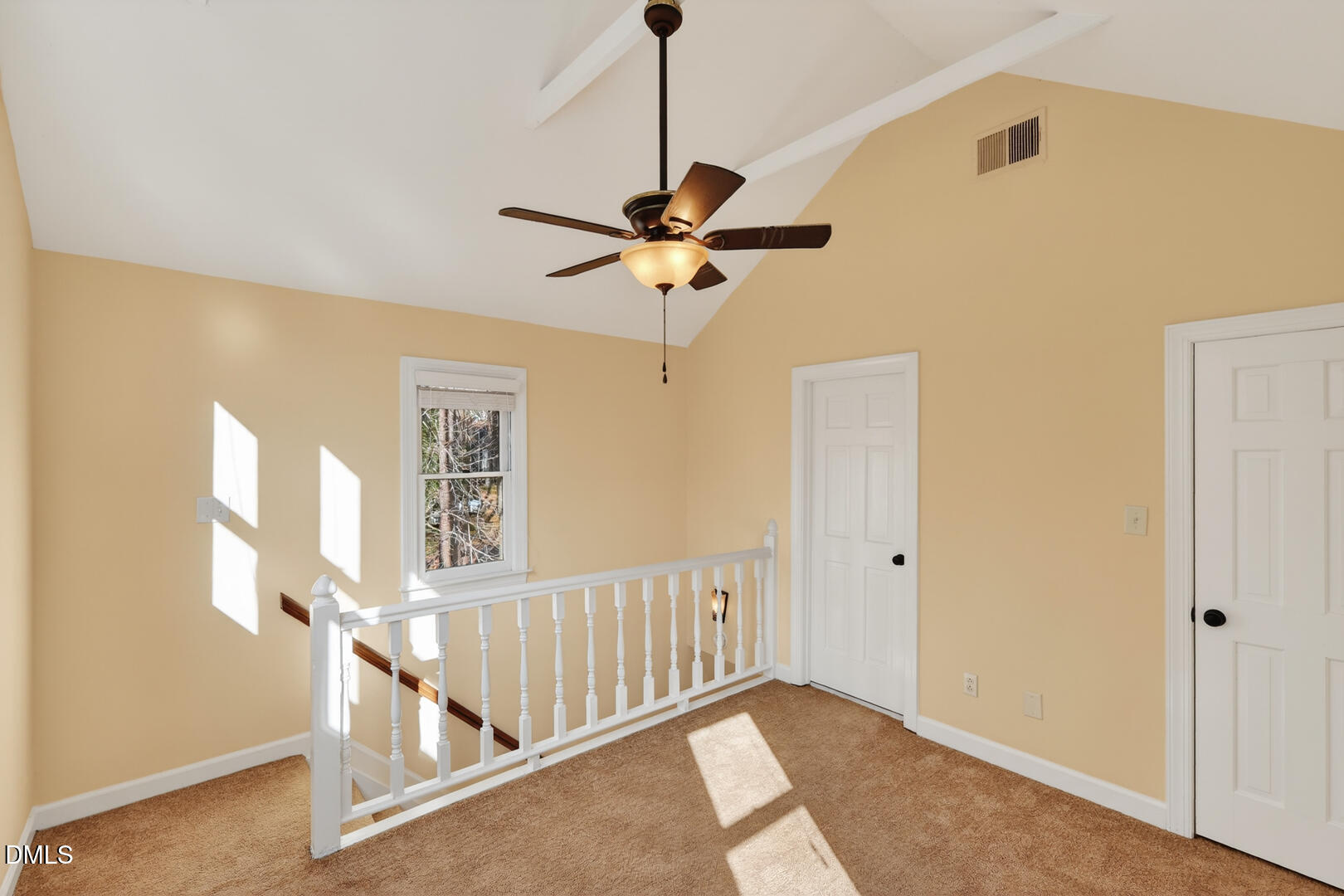 1707 Falls Church Road Raleigh, NC 27609 - Photo 37 of 64 a view of a livingroom with a ceiling fan