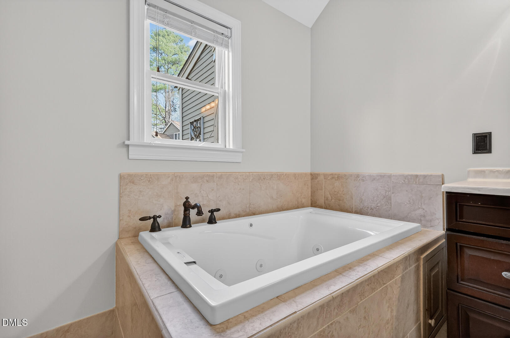 1707 Falls Church Road Raleigh, NC 27609 - Photo 48 of 64 a white bath tub sitting next to a white sink