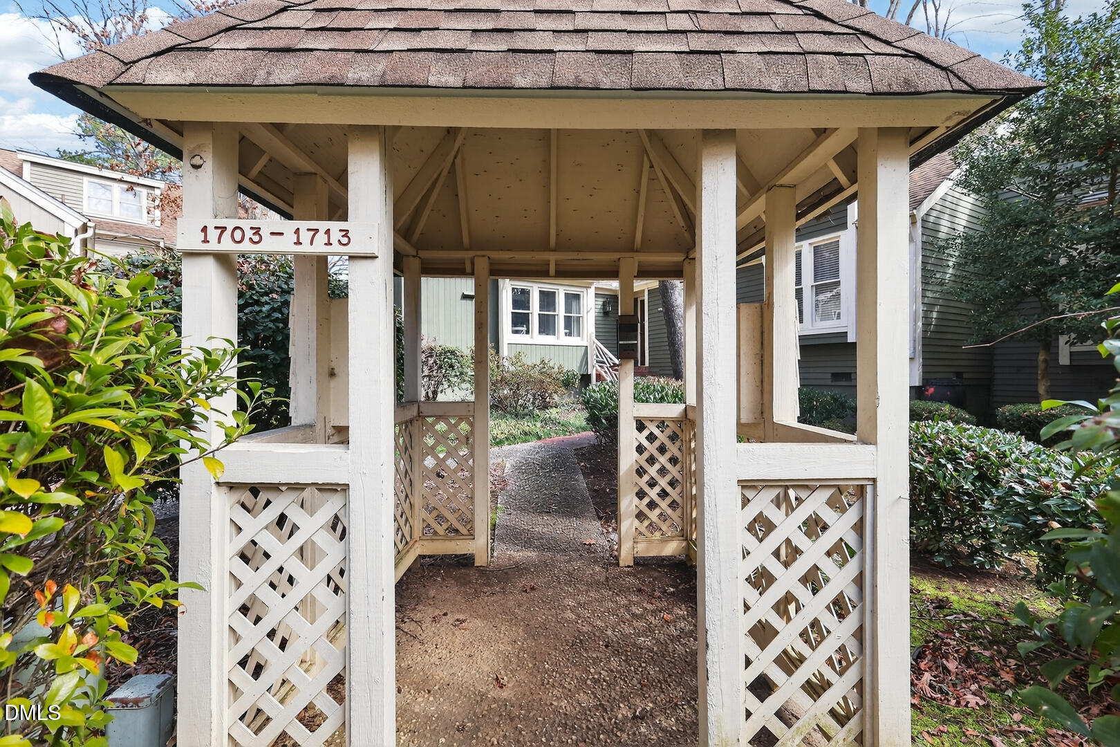 1707 Falls Church Road Raleigh, NC 27609 - Photo 64 of 64 a view of a small house with potted plants