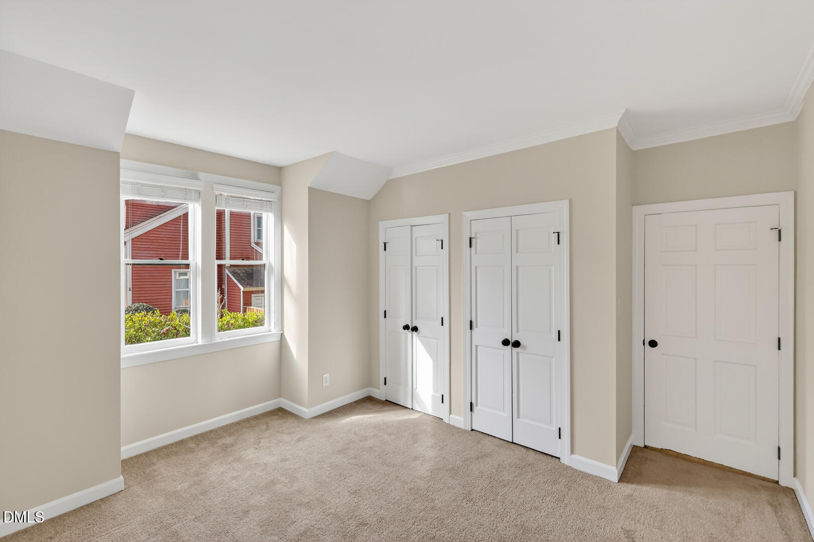 1707 Falls Church Road Raleigh, NC 27609 - Photo 7 of 64 a view of an empty room with a window