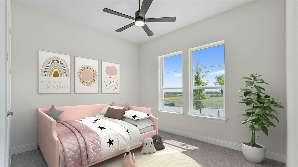 1019 Pitchfork Road Royse City, TX 75189 - Photo 17 of 25 a bed sitting in a bedroom next to a window