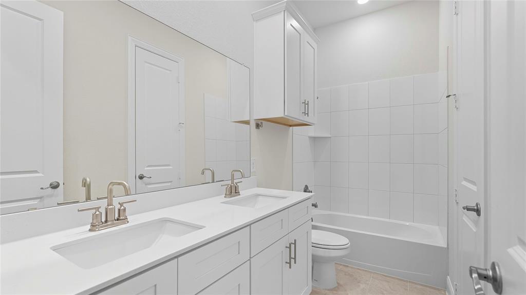 1019 Pitchfork Road Royse City, TX 75189 - Photo 20 of 25 a bathroom with a sink a toilet and shower