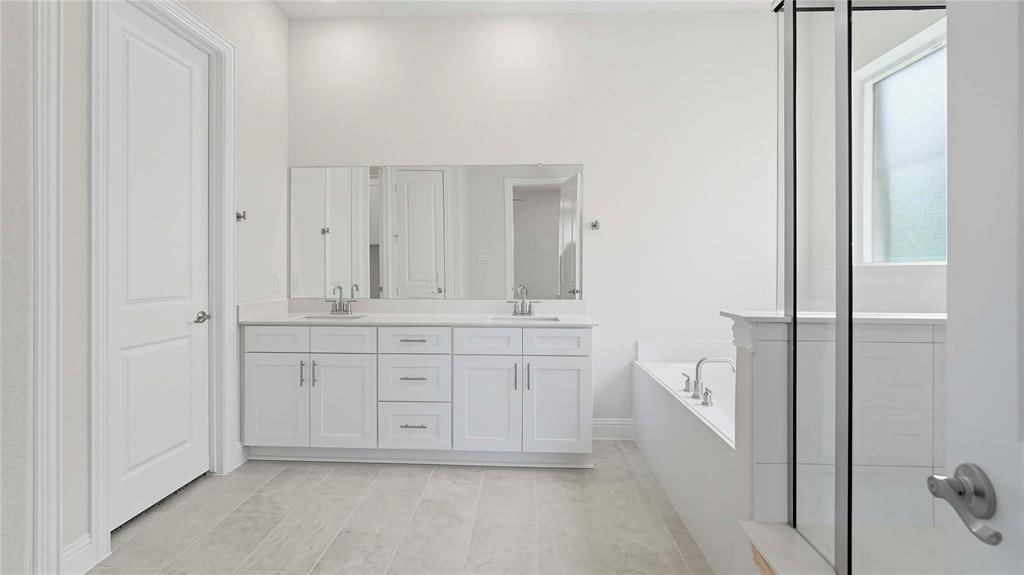 1019 Pitchfork Road Royse City, TX 75189 - Photo 21 of 25 a bathroom with a sink and a mirror