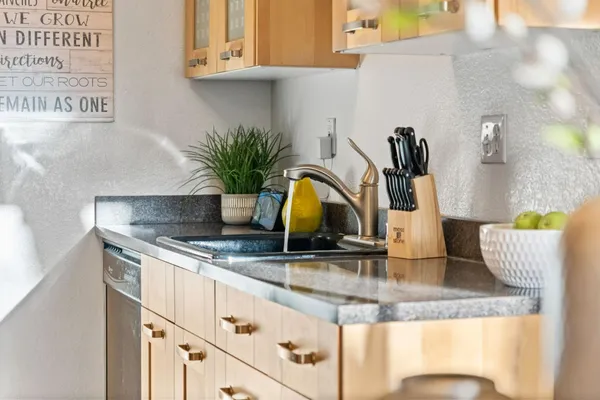 a kitchen with a stove and a microwave