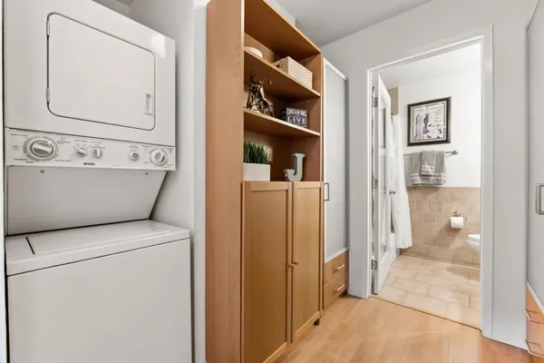 a bathroom with a glass shower door