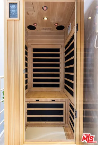 a bathroom with a bathtub and shower