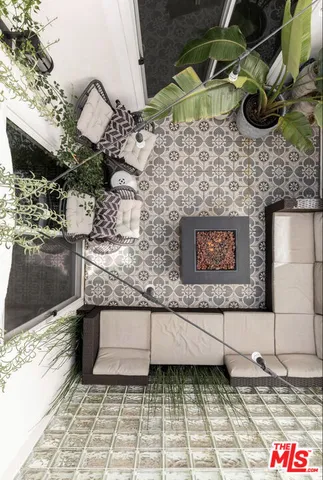 a view of a terrace with wooden fence