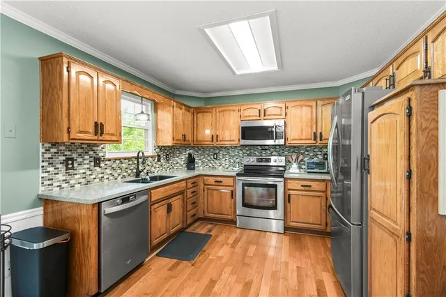 $320,000 | 1302 Huntington Lane, Greenwood, MO 64034