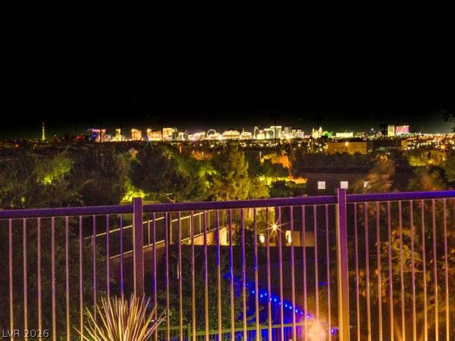 6014 Willow Ridge Court Las Vegas, NV 89135 - Photo 96 of 99 Capture the breathtaking city lights from your private vantage point, offering an unparalleled nocturnal panorama.