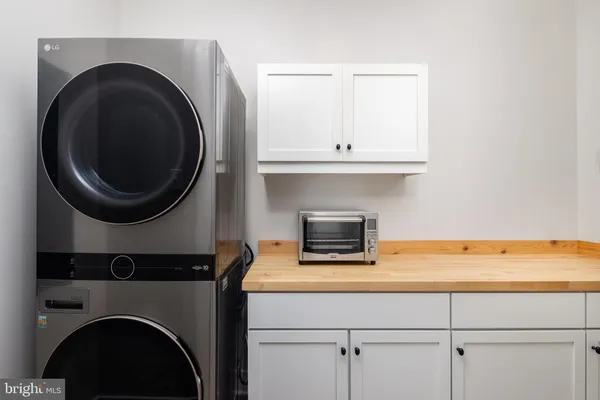 a view of a house and a yard