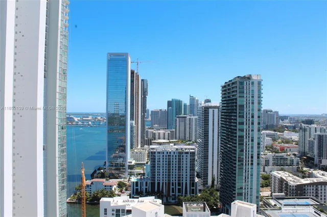 a view of a city with tall buildings