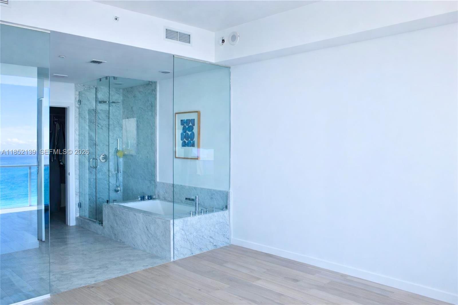 480 Northeast 31st Street, Unit 3301 Miami, FL 33137 - Photo 7 of 32 a view of bathroom with shower