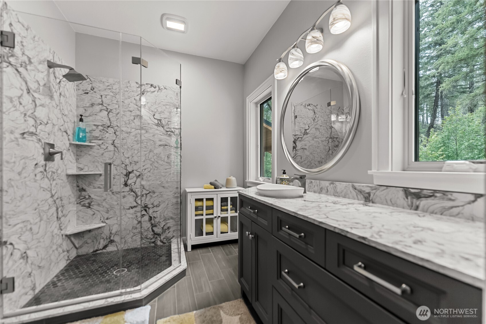 201 Libby Creek Road Carlton, WA 98814 - Photo 18 of 37 a bathroom with a granite countertop sink a mirror and shower