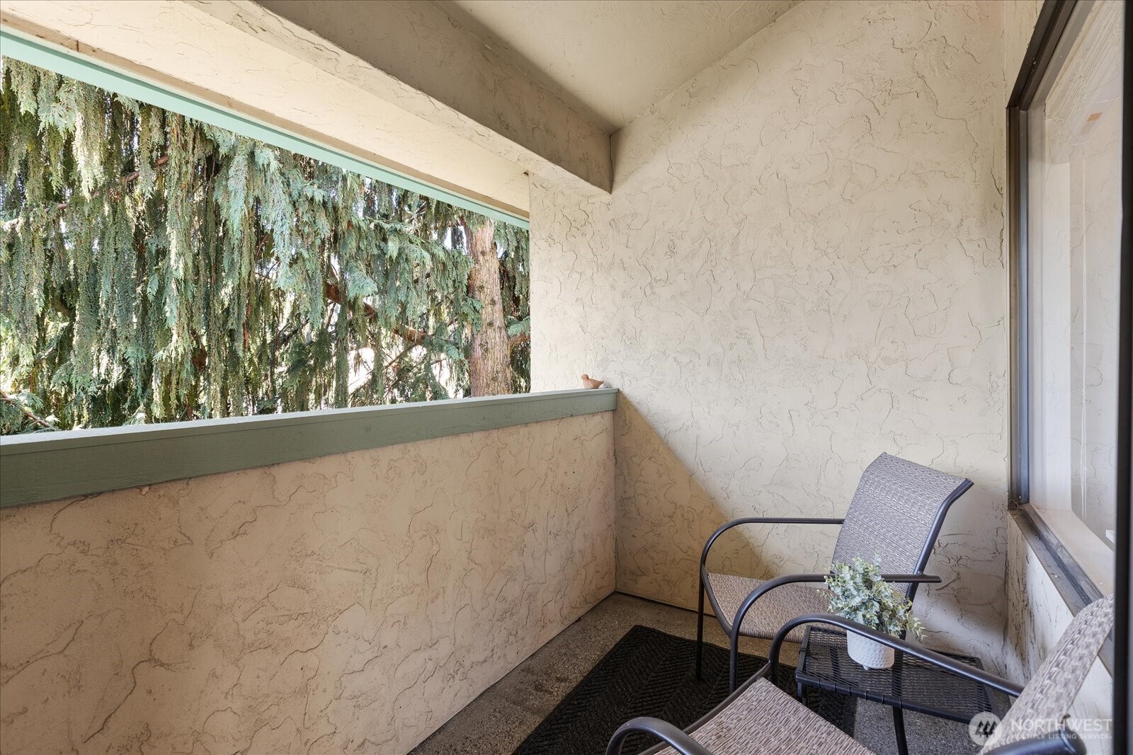 3024 Northeast 143rd Street, Unit 305 Seattle, WA 98155 - Photo 16 of 17 a view of a chair in a room