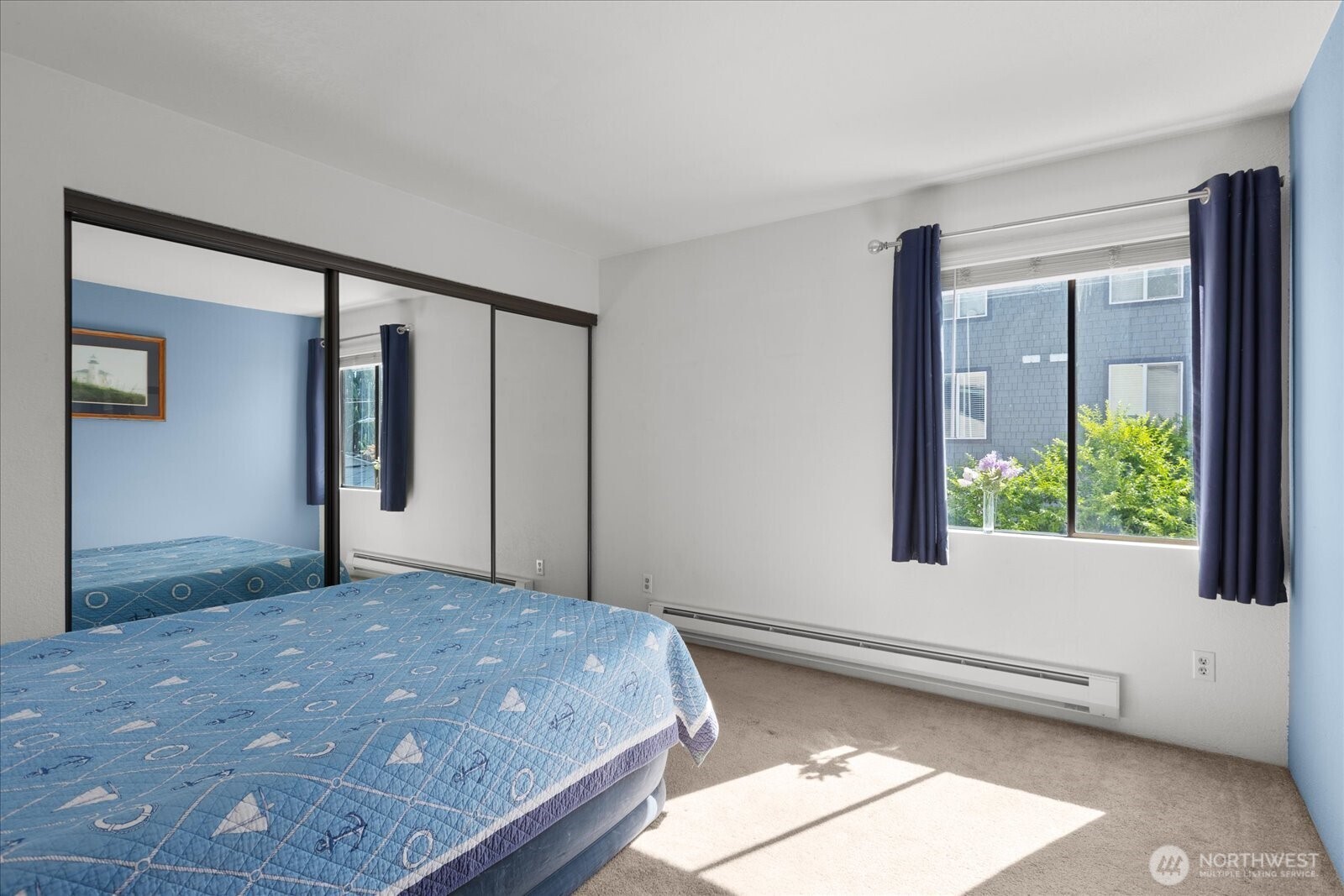 3024 Northeast 143rd Street, Unit 305 Seattle, WA 98155 - Photo 7 of 17 a view of a room that has a window in it