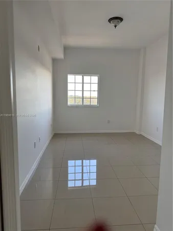 an empty room with a window