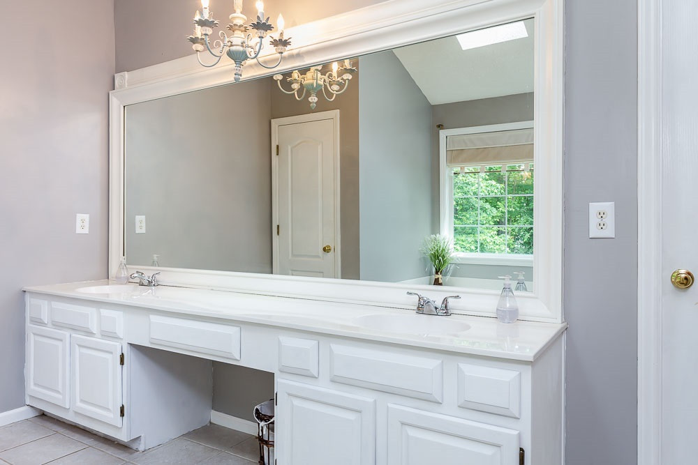 9501 Miranda Drive Raleigh, NC 27617 - Photo 17 of 30 Light and bright with windows and a skylight! Master Bath