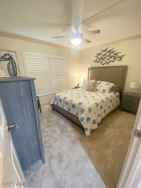 16007 Davis Road, Unit 614 Fort Myers, FL 33908 - Photo 11 of 17 a bedroom with a bed and a night stand