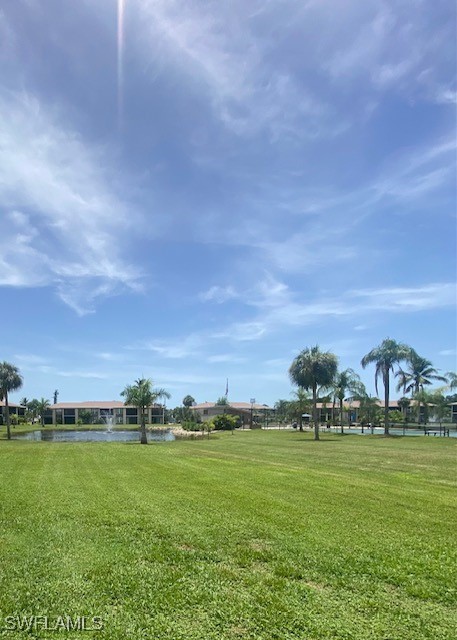 16007 Davis Road, Unit 614 Fort Myers, FL 33908 - Photo 16 of 17 a view of building with outdoor space