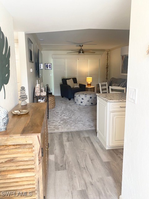 16007 Davis Road, Unit 614 Fort Myers, FL 33908 - Photo 2 of 17 a living room with furniture and a flat screen tv
