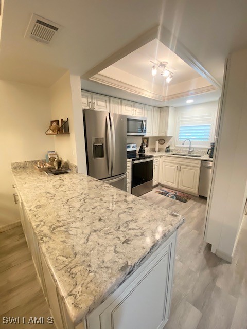 16007 Davis Road, Unit 614 Fort Myers, FL 33908 - Photo 3 of 17 a large kitchen with kitchen island granite countertop a sink stove and refrigerator