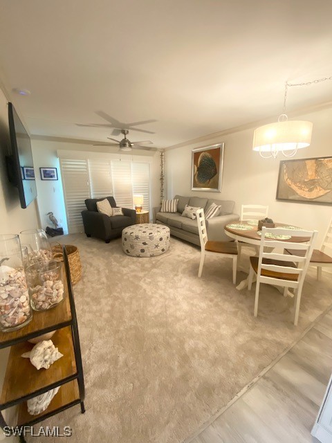 16007 Davis Road, Unit 614 Fort Myers, FL 33908 - Photo 4 of 17 a living room with furniture and a flat screen tv