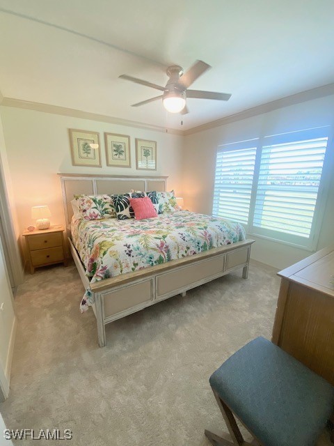 16007 Davis Road, Unit 614 Fort Myers, FL 33908 - Photo 9 of 17 a bedroom with a bed and window