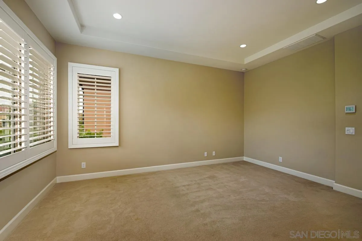 82 Brindisi Irvine, CA 92618 - Photo 22 of 49 a view of an empty room with a window